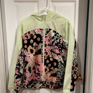 This product is an Adidas colorful wind breaker in the size M  in women’s